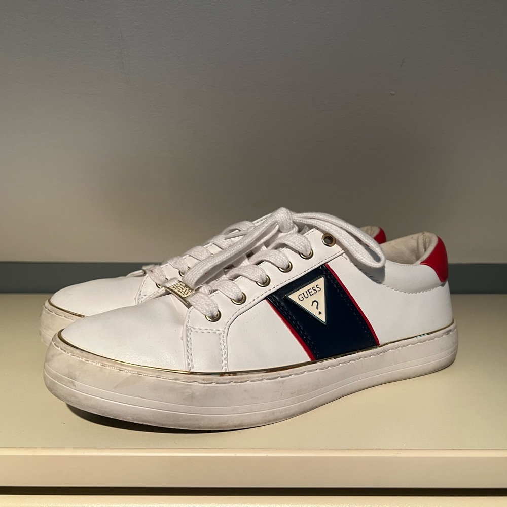 White blue and red Guess brand low top sneakers